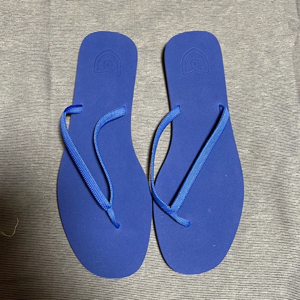 NWOT Rothy’s splash flip size 10